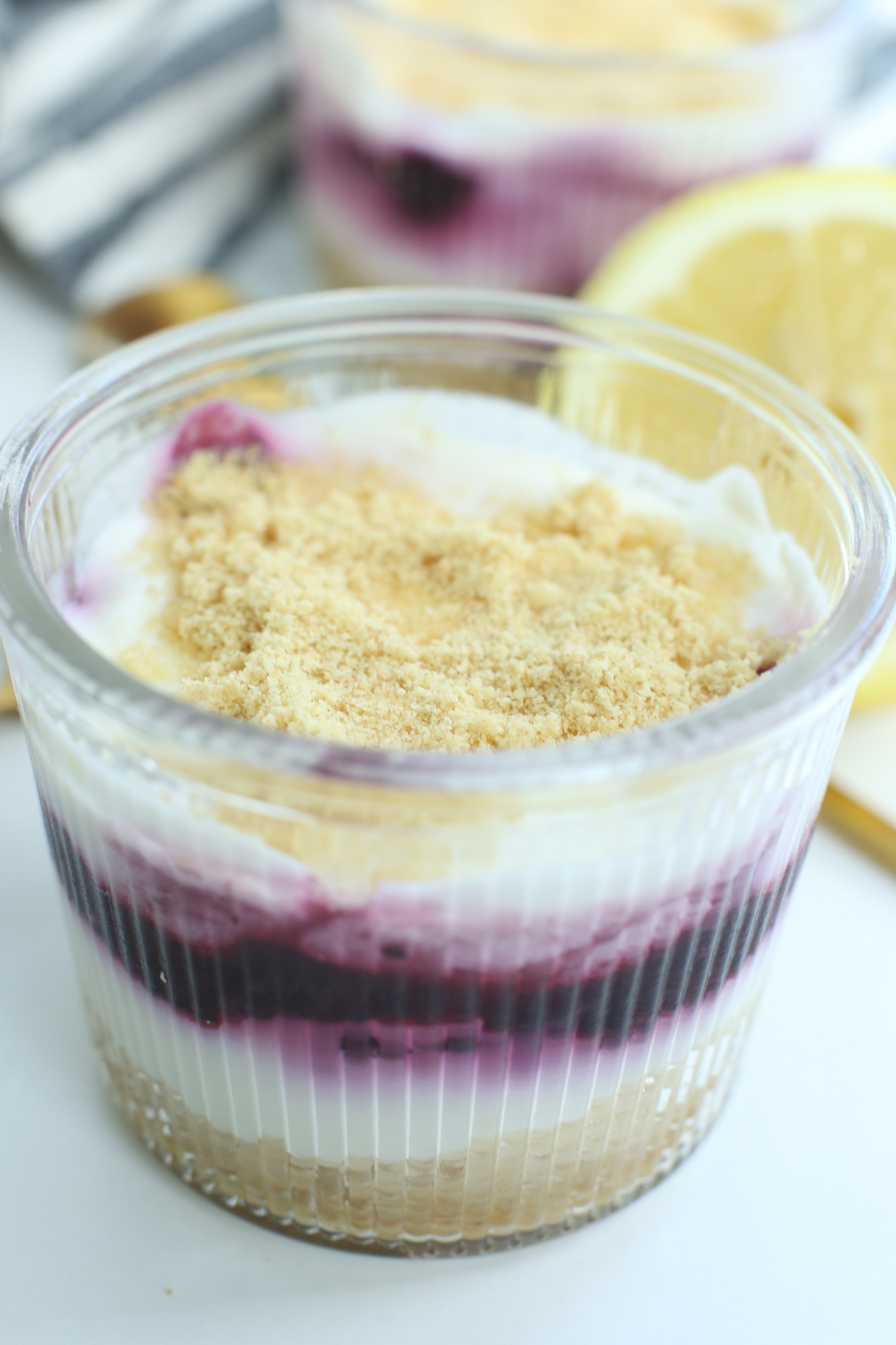 a close up photo of No Bake Lemon Blueberry Cheesecake Parfaits 