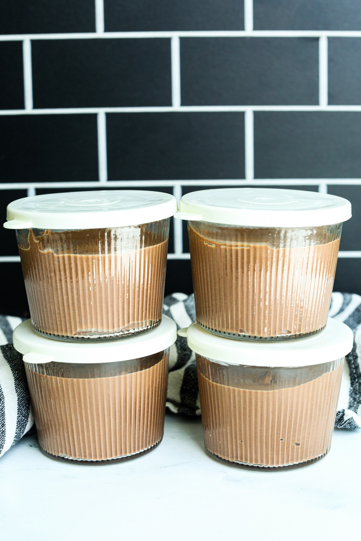 cottage cheese chocolate mousse in individual dessert cups with lids