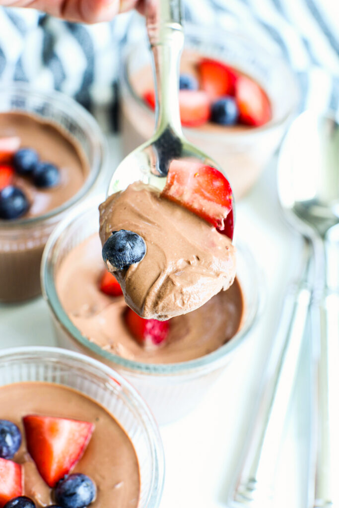A spoonful of cottage cheese chocolate mousse