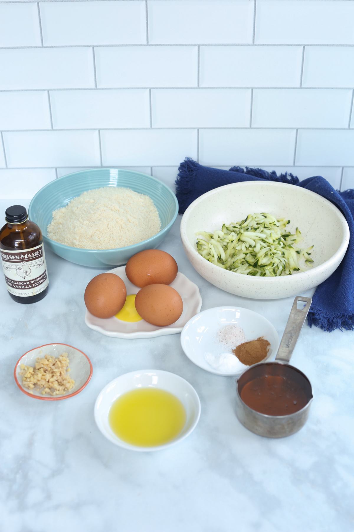 anti-inflammatory zucchini cake ingredients on a counter top