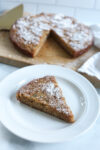 anti inflammatory zucchini cake with one slice removed and on a plate