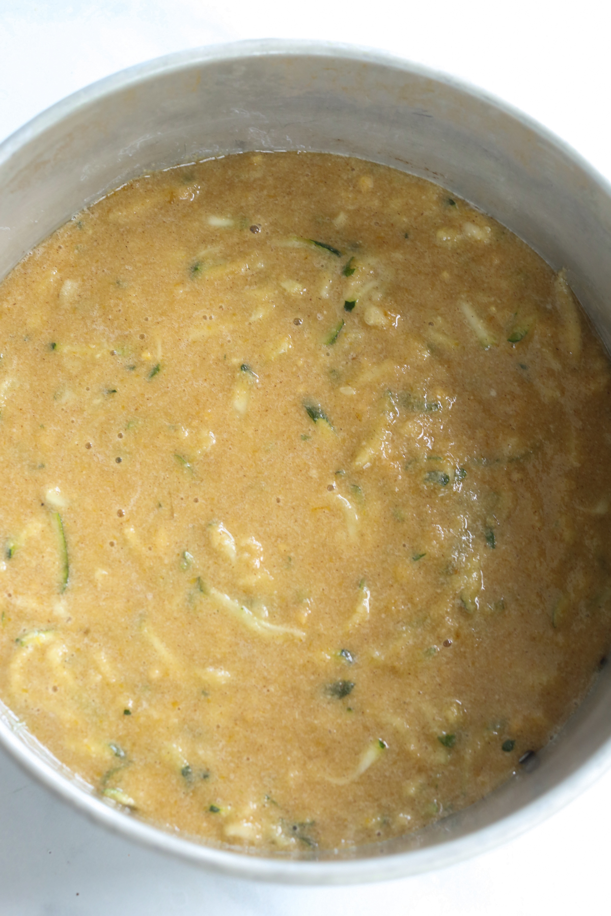 raw cake batter in pan