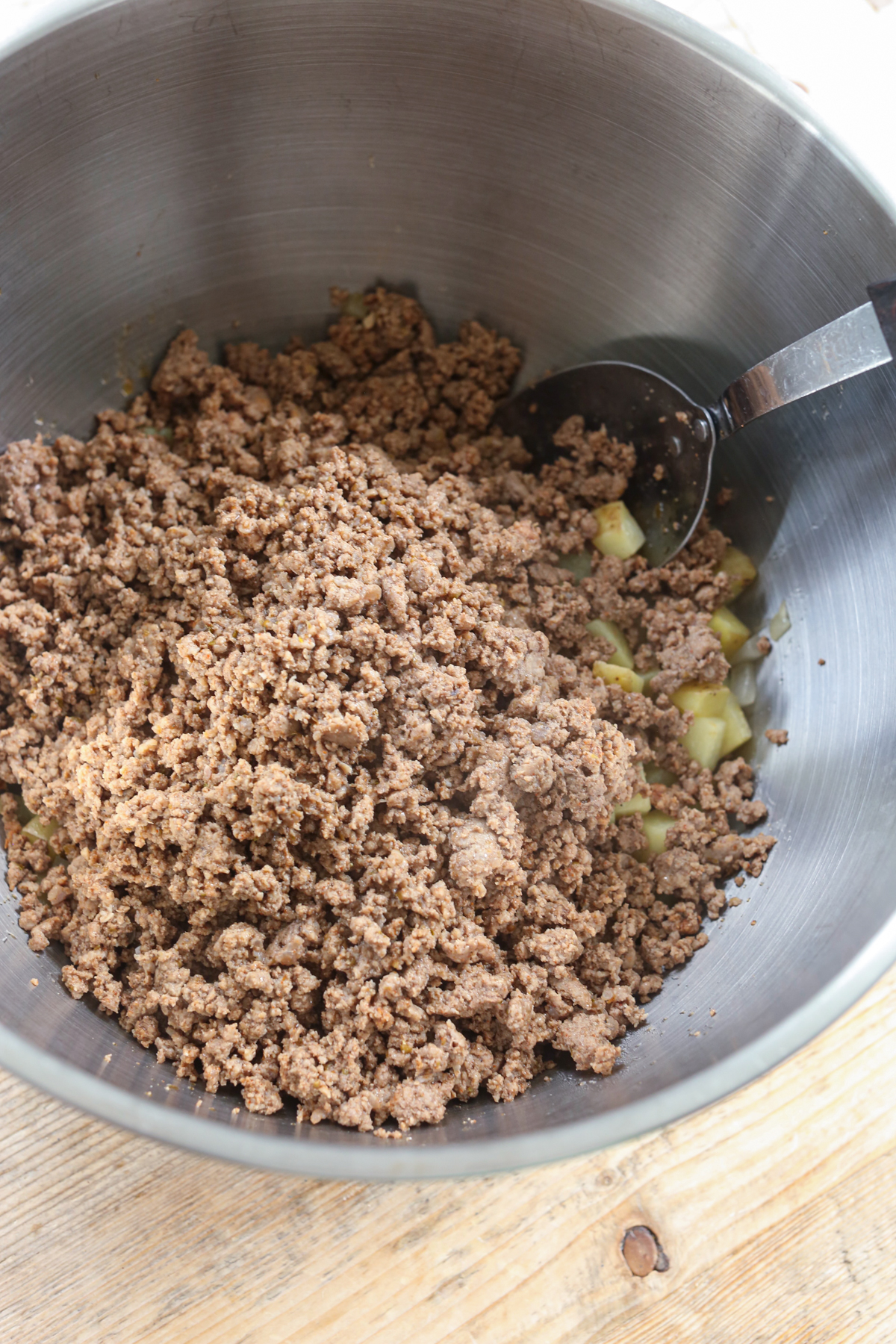ground beef added to large bowl